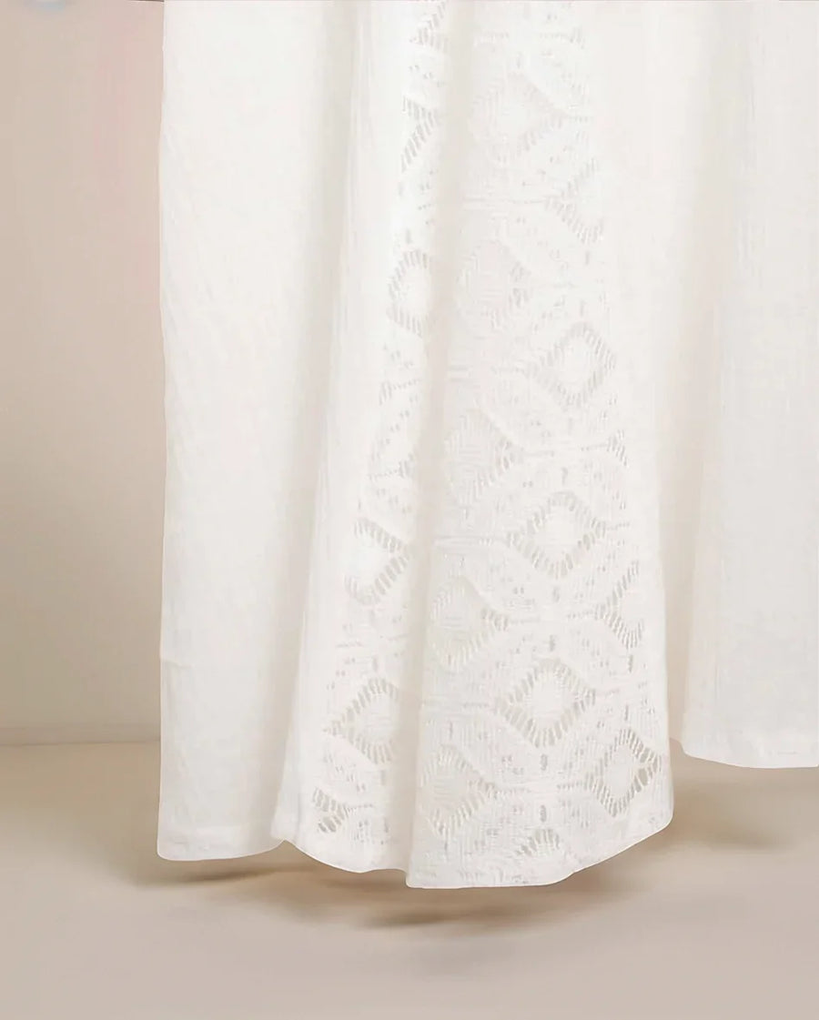 White lace skirt on a neutral background