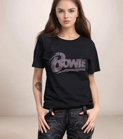 Person wearing a black t-shirt with 'Bowie' text, standing against a plain background