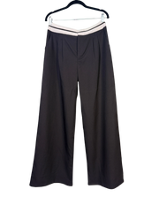 black pants with a white waistband on a white background