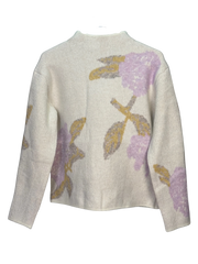 Floral patterned sweater on a white background