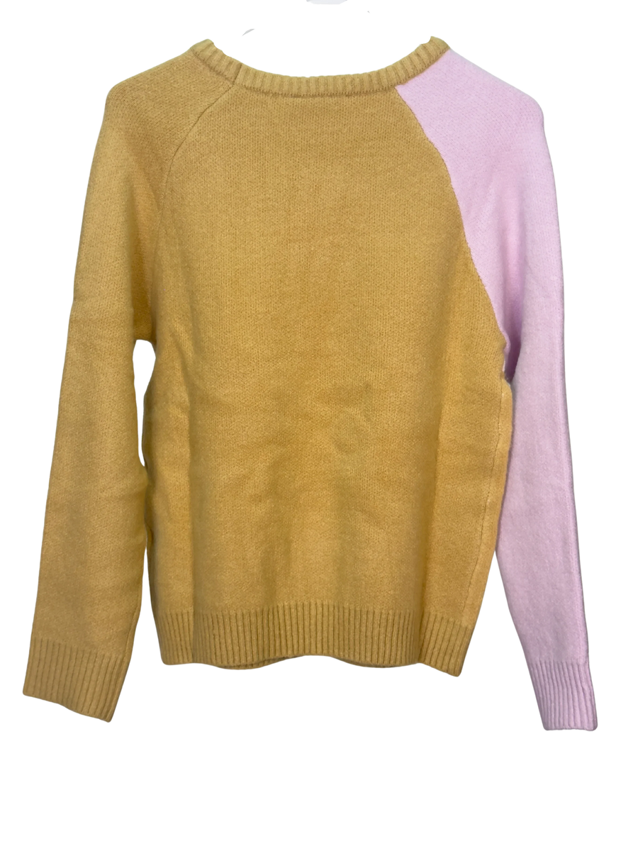 Two-tone sweater with camel on back and left sleeve and pink on the right sleeve on a white background