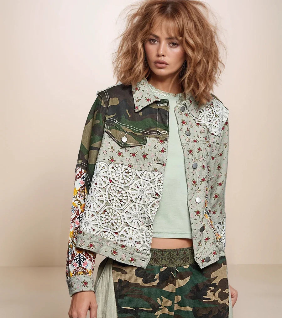 woman wearing a floral and camo patchwork jacket with camo pants.