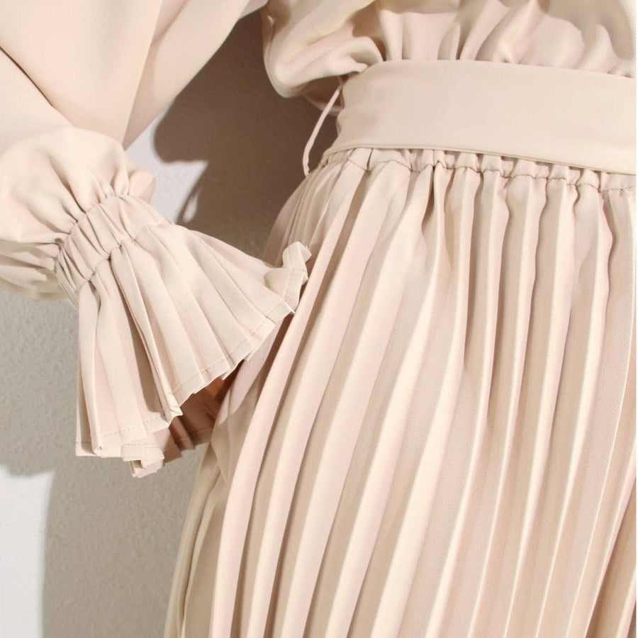 SOPHISTICATED PLEATED ROMPER