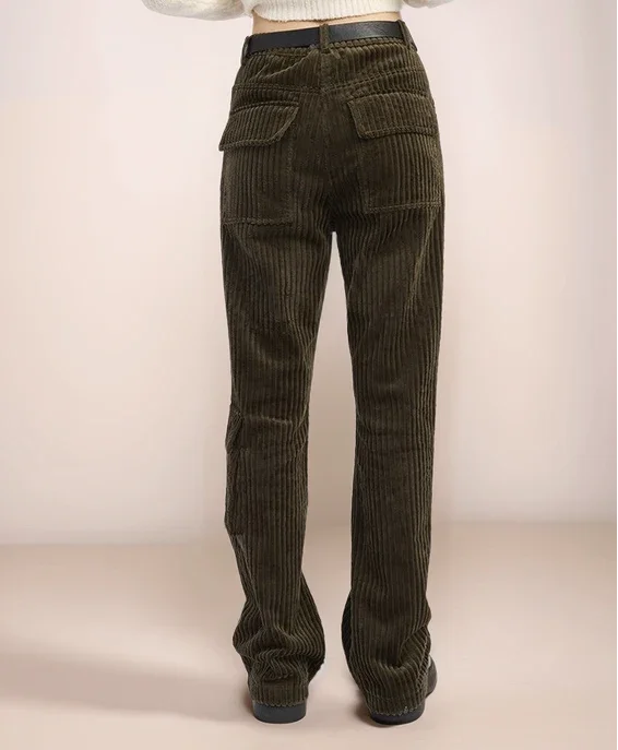 olive green corduroy pants on a plain background