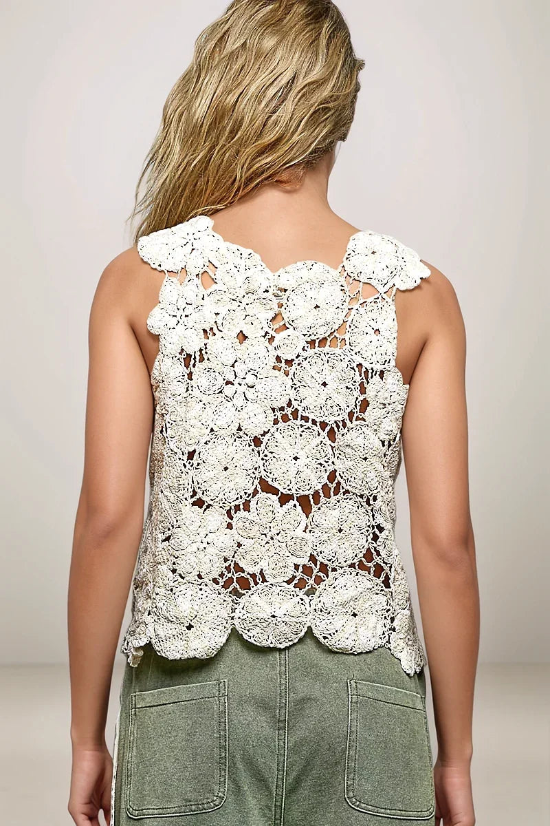 Back view of the POL Botanica boho crochet top displaying the intricate openwork design and airy silhouette.