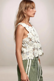 Side view of the POL Botanica open knit crochet blouse highlighting the relaxed fit and breathable, lightweight construction.