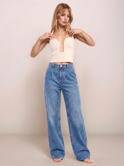 Halter Neck Cutout Top full front view in cream styled with wide leg jeans