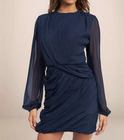 navy blue dress that is draped and has sheer sleeves