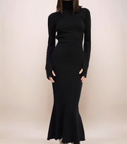 Black long-sleeve dress on a plain background