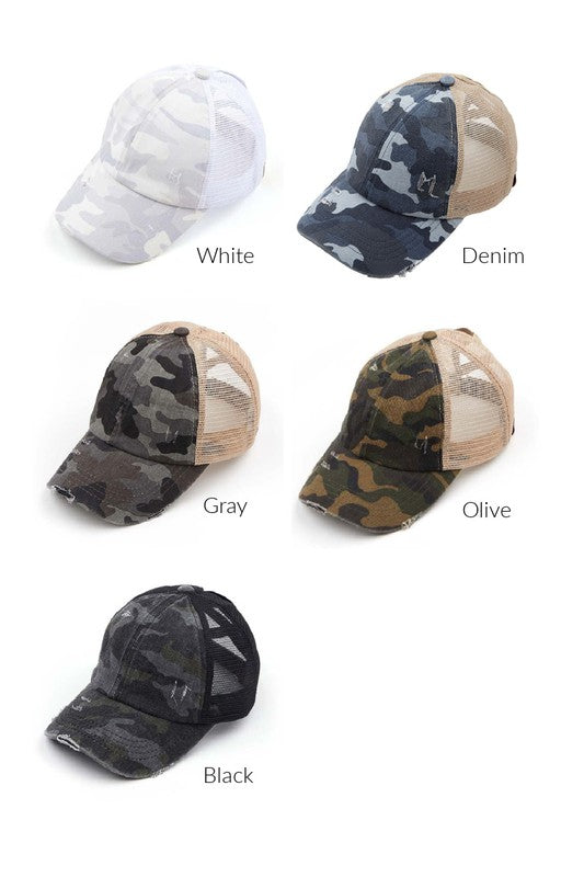 Collection of camouflage baseball caps in various colors on a white background
