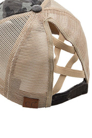 Beige and camouflage trucker hat with mesh back on a white background