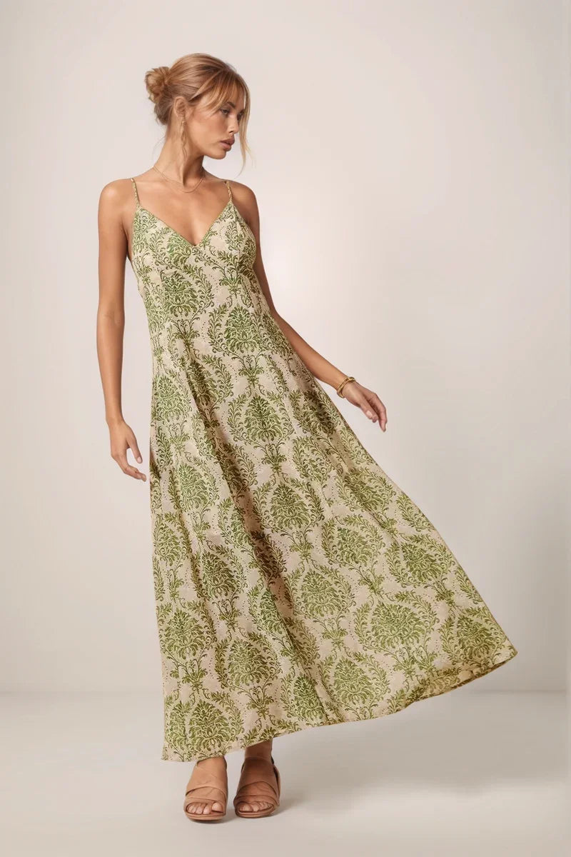 Full-length view of the green damask floral maxi dress paired with sophisticated nude sandals.