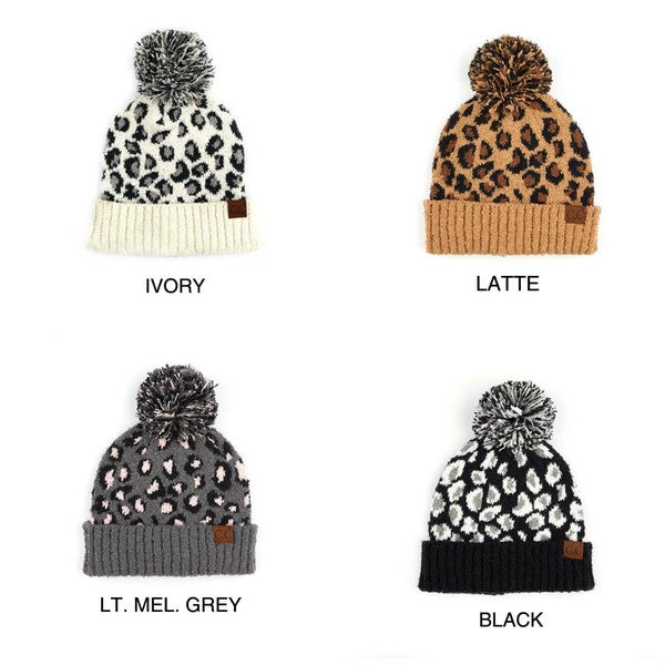 Four leopard print beanies in different colors with labels on a white background