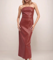 Red strapless dress worn by a model on a plain background