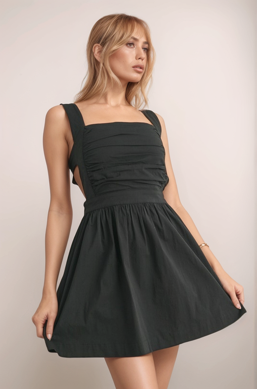 Maeve mini dress in black front view with smocked bodice, square neckline, wide straps, and A-line skirt