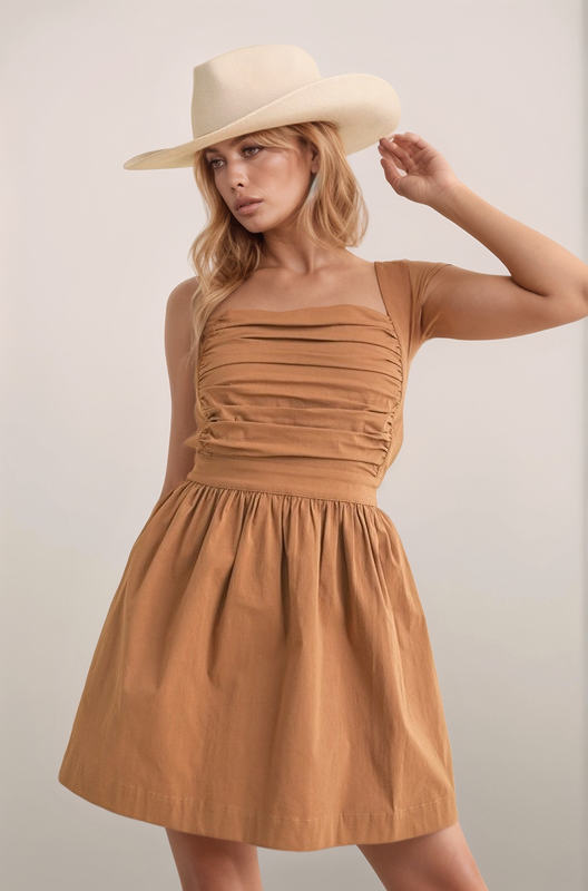 Chocolate Maeve mini dress front view with smocked bodice, square neckline, wide straps, and A-line skirt