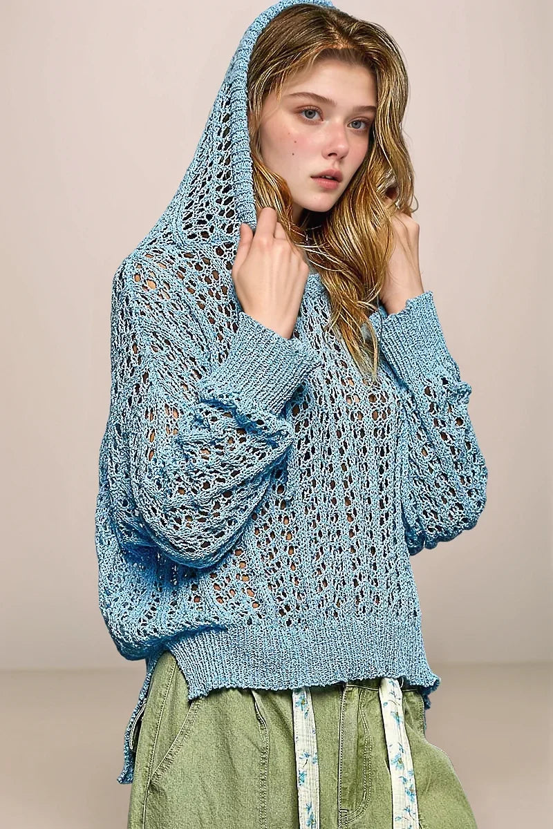 Front view of the POL Skye knit sweater with the hood pulled up, emphasizing the soft drape and practical, sporty-chic hoodie design.