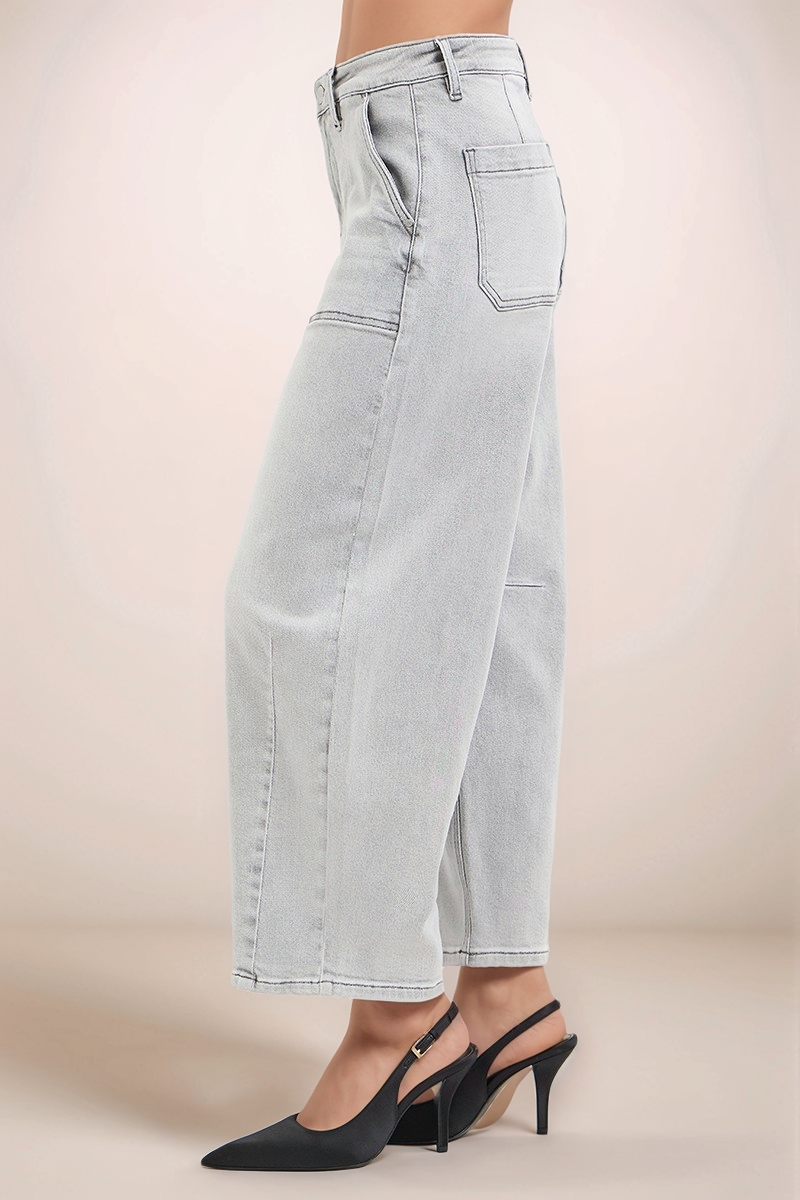Side view of RISEN slouchy cropped barrel jeans in light wash denim with relaxed fit and cropped tapered leg