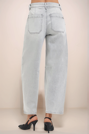Back view of RISEN slouchy cropped barrel jeans in light wash denim with relaxed fit and back pockets