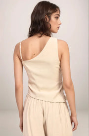 Back view of the Sonora one-shoulder top in sand, showcasing the clean asymmetrical cut and the thin strap detail across the shoulder.