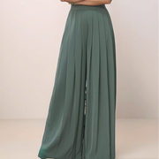green wide leg pants against a plain background